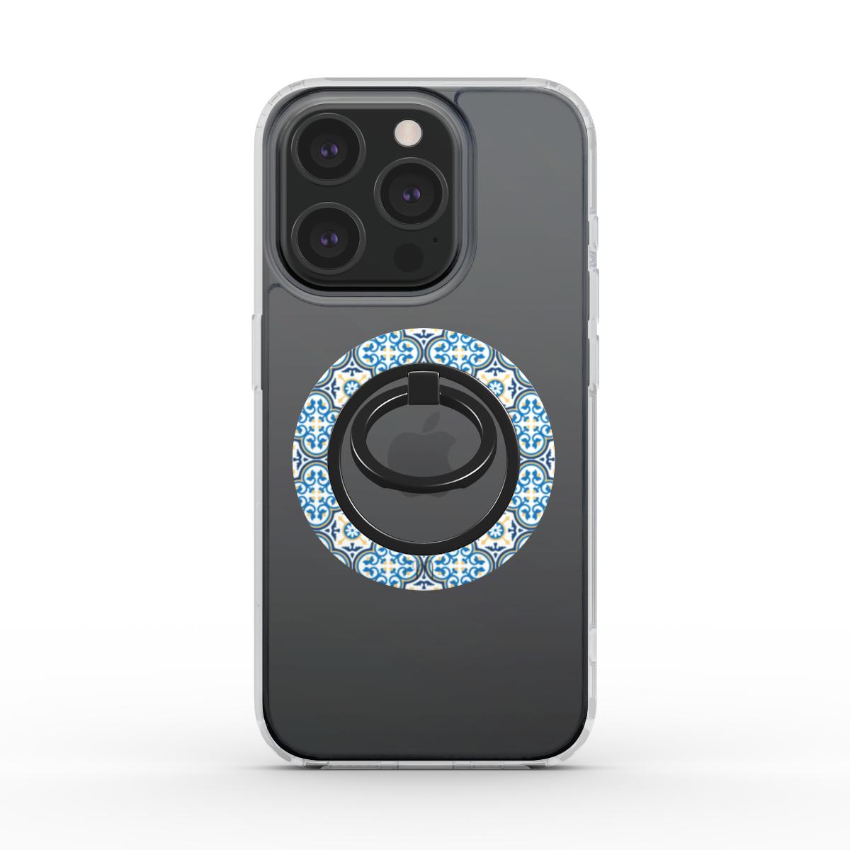Maduma Fjura Blu Ring Holder in action, showcasing its floral design and secure phone grip.