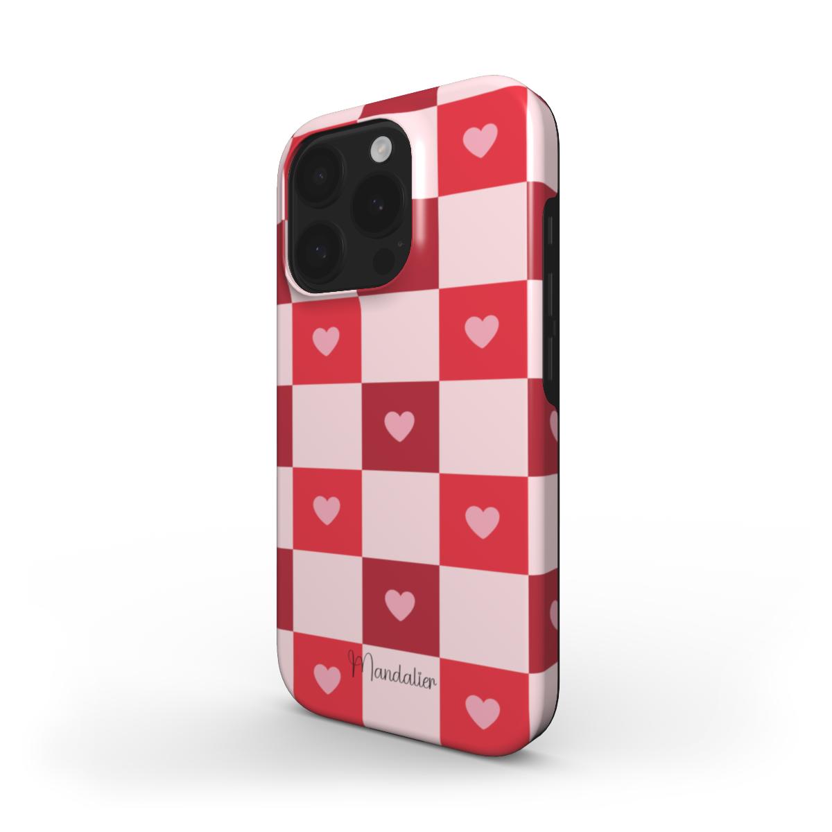 MagSafe tough case with a glossy finish and vibrant plaid pattern.