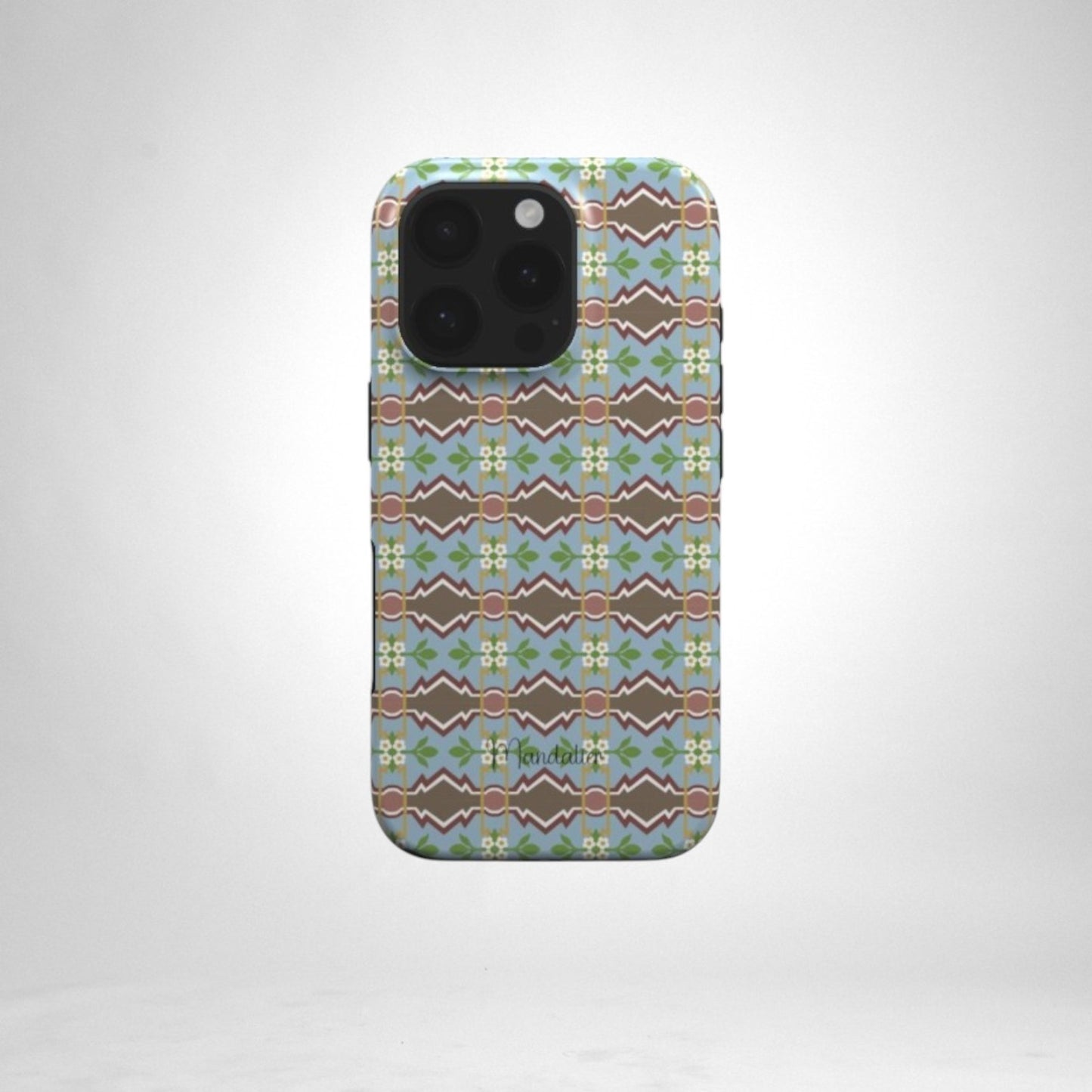 A phone adorned with the Maduma Fjura Selvaġġa MagSafe Tough Phone Case, blending bold elegance with functional protection.