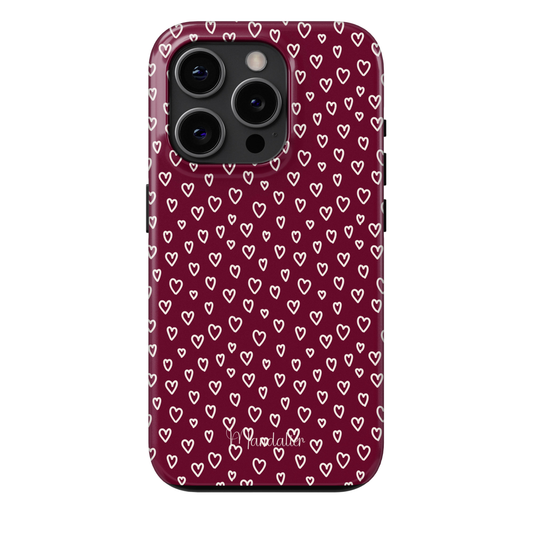 Burgundy Beats Tough Phone Case – A heart-patterned protective case in deep burgundy hues, blending style and durability