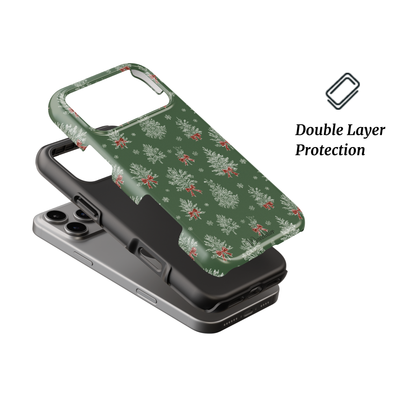 Festive Whimsy Tough Phone Case by Mandalier — forest-green case with white wreaths and red bows from the Classic Christmas Collection, featuring durable dual-layer protection.