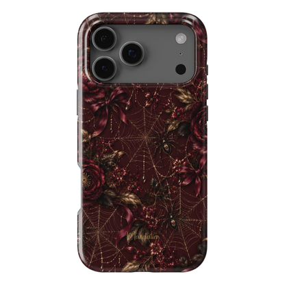 Black Cherry Web phone case featuring burgundy florals, golden spider webs, ribbons and jewel-inspired details from the After Dark Collection, available in MagSafe and Tough options