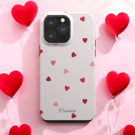 Sprinkled Hearts Tough Phone Case on a pastel-colored desk setup, showcasing its charming and protective design.